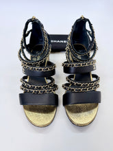 Load image into Gallery viewer, CHANEL Black Leather and Gold Chain CC Sandals Size 37 1/2