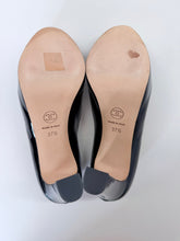 Load image into Gallery viewer, CHANEL Black Patent Leather CHANEL Letters Platform Pump Size 37 1/2