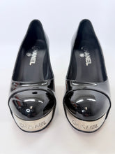Load image into Gallery viewer, CHANEL Black Patent Leather CHANEL Letters Platform Pump Size 37 1/2