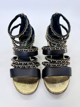 Load image into Gallery viewer, CHANEL Black Leather and Gold Chain CC Sandals Size 37 1/2