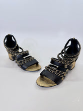 Load image into Gallery viewer, CHANEL Black Leather and Gold Chain CC Sandals Size 37 1/2