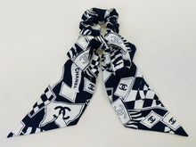 Load image into Gallery viewer, CHANEL Navy Blue and White CC Print Silk Hair Bow
