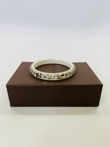 Inclusion bracelet Louis Vuitton Ecru in Plastic - 34291572
