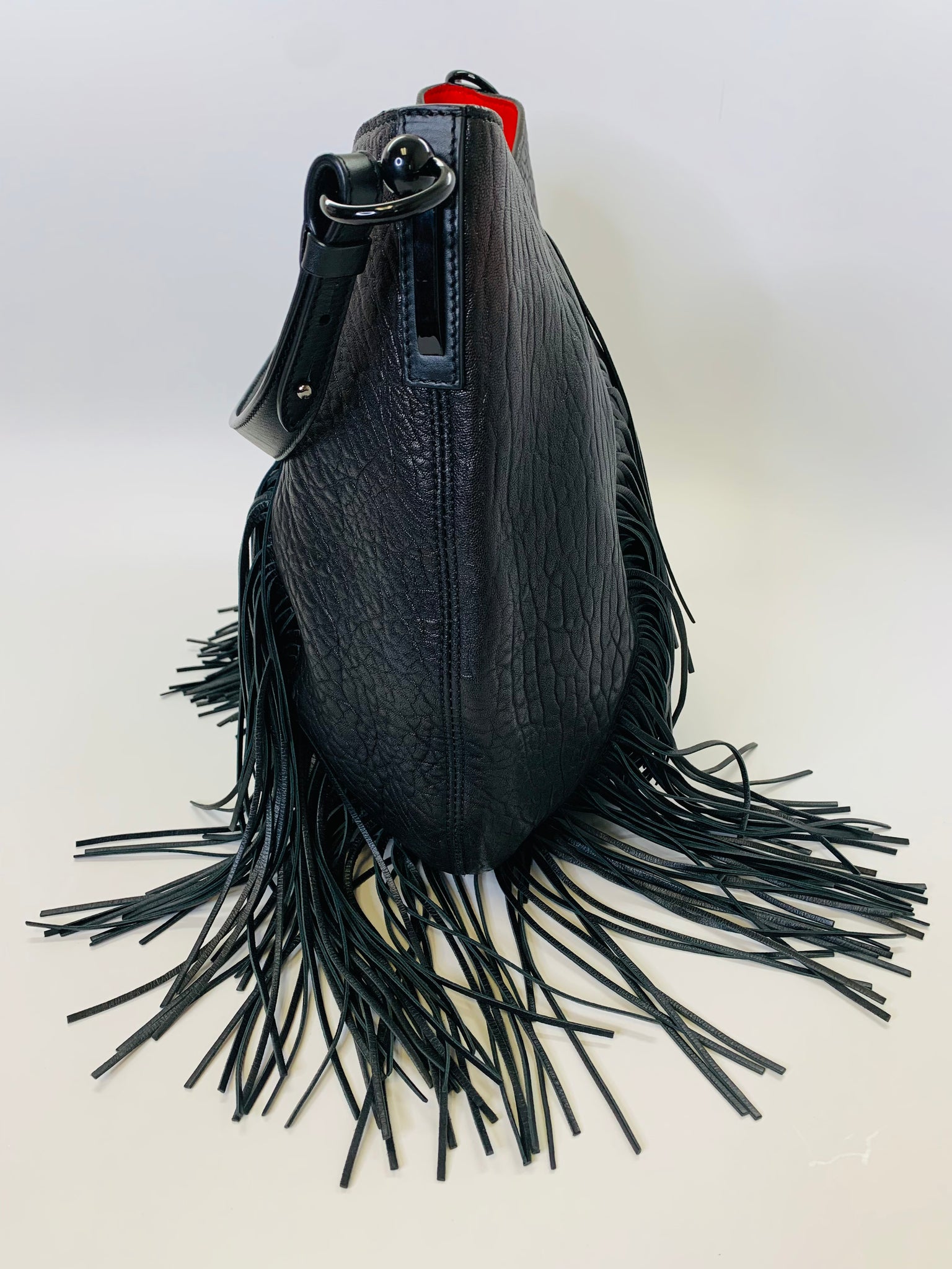 CHRISTIAN LOUBOUTIN Black Pebbled Leather Fringe Lucky L Backpack - Fi