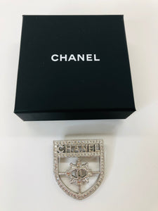 CHANEL Silver and Crystal CC Shield Brooch